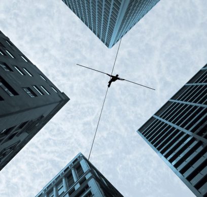 Tightrope walker over buildings