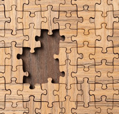 Wooden puzzle with missing pieces