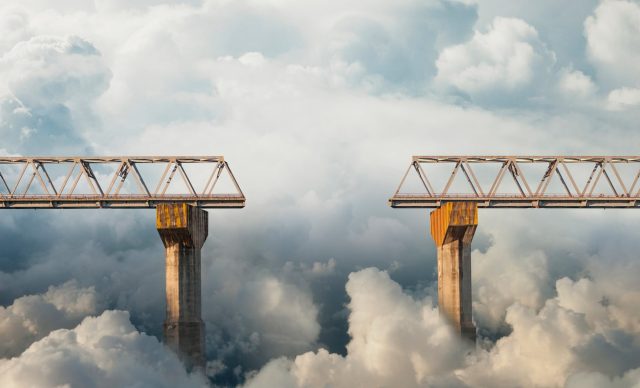 Clouds surrounding gap in bridge