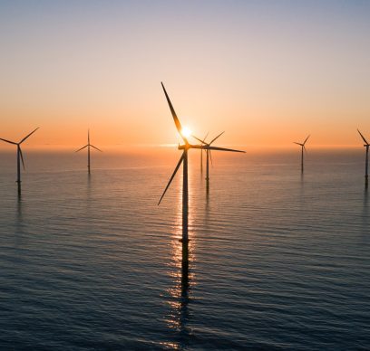 Offshore wind turbines at sunrise