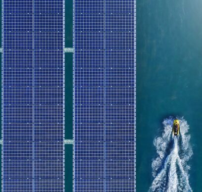 Aerial view of solar panels floating in a dam