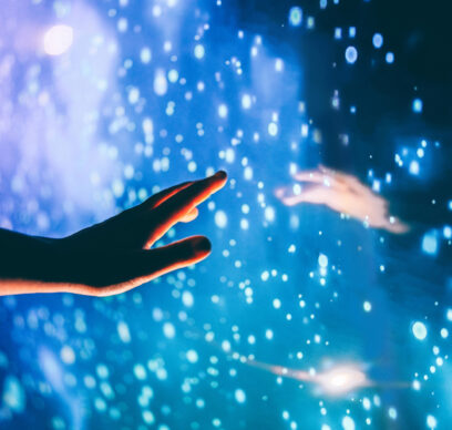 A human hand reaching out to the dark unknown