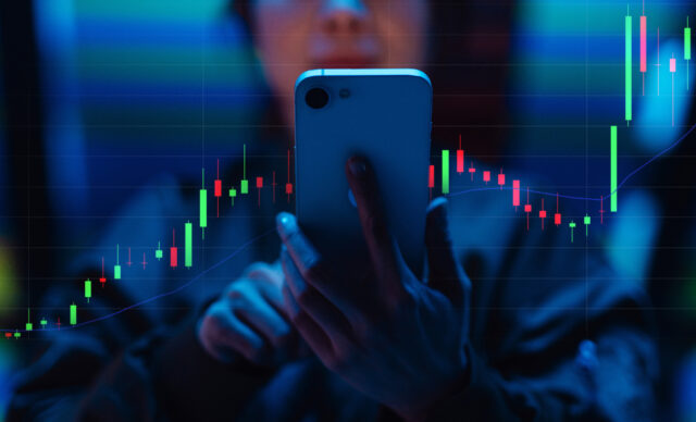 Young woman analysing data with augmented reality device